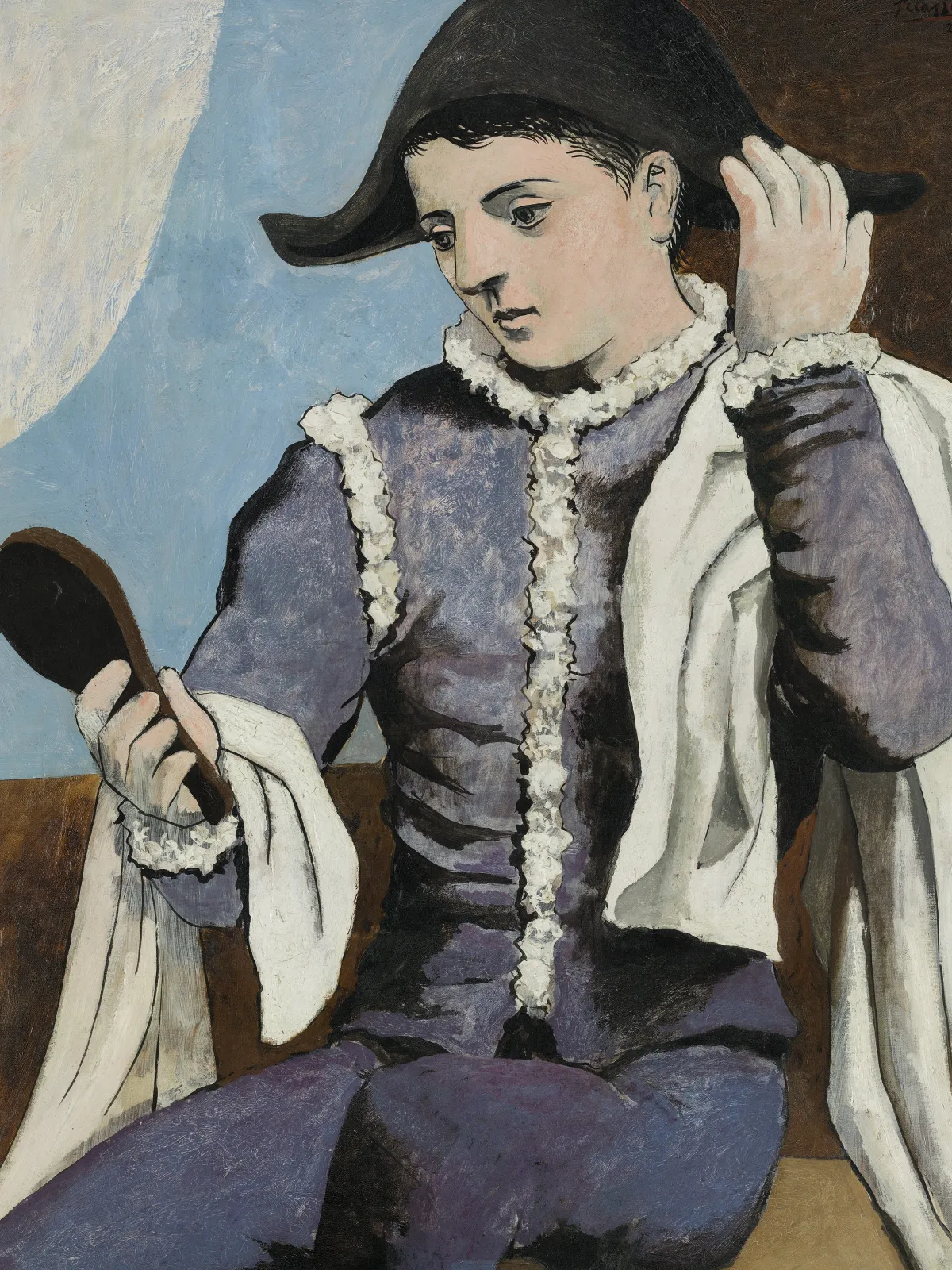 Harlequin with a Mirror (1923) by Pablo Picasso