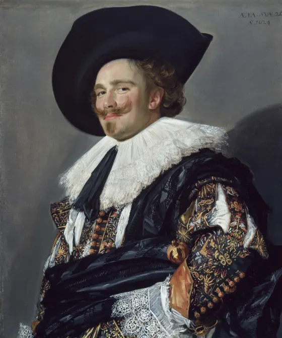 The Laughing Cavalier by Frans Hals: a young man in an embroidered doublet and wide black hat
