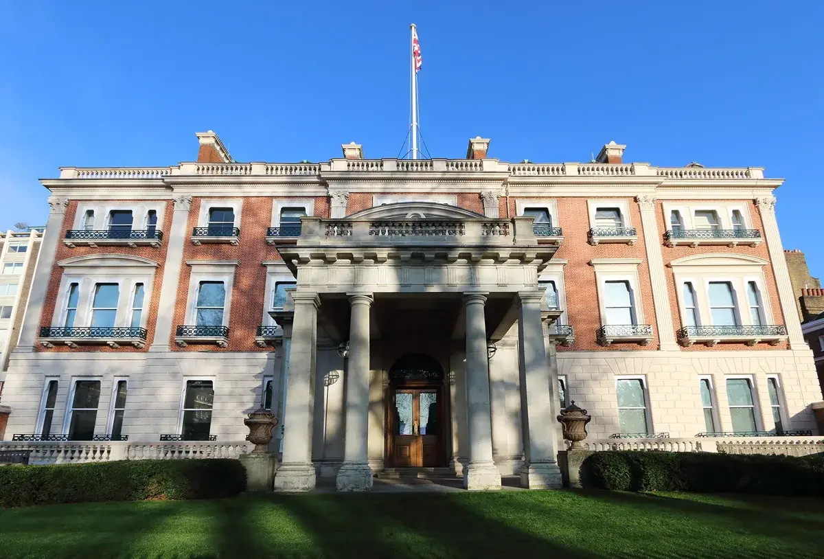 Hertford House, the Wallace Collection: a red brick Georgian mansion with a stone portico and columned entrance, set behind a lawn on Manchester Square